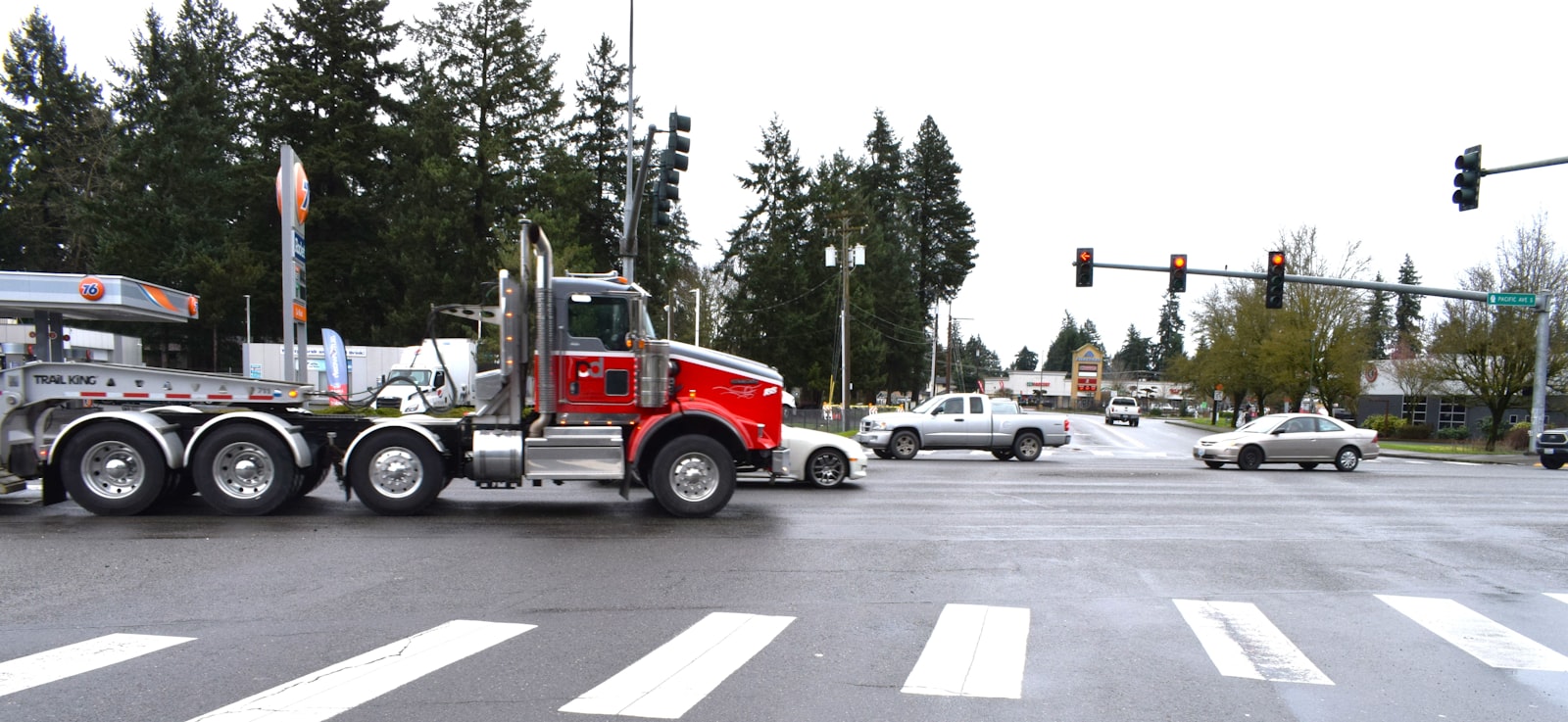 Driver crossing a city corridor